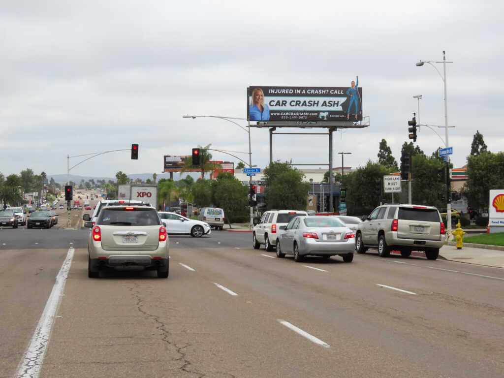 A billboard design for the Rawlins Law Firm in San Diego, California featuring "Car Crash Ash"
